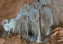 What are stalactites and stalagmites formed from?